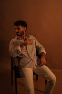 מכופתרת פסים