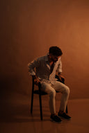 מכופתרת פסים